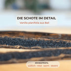 Nahaufnahme einer aufgeschnittenen Vanilleschote aus Bali mit zahlreichen schwarzen Vanillesamen.